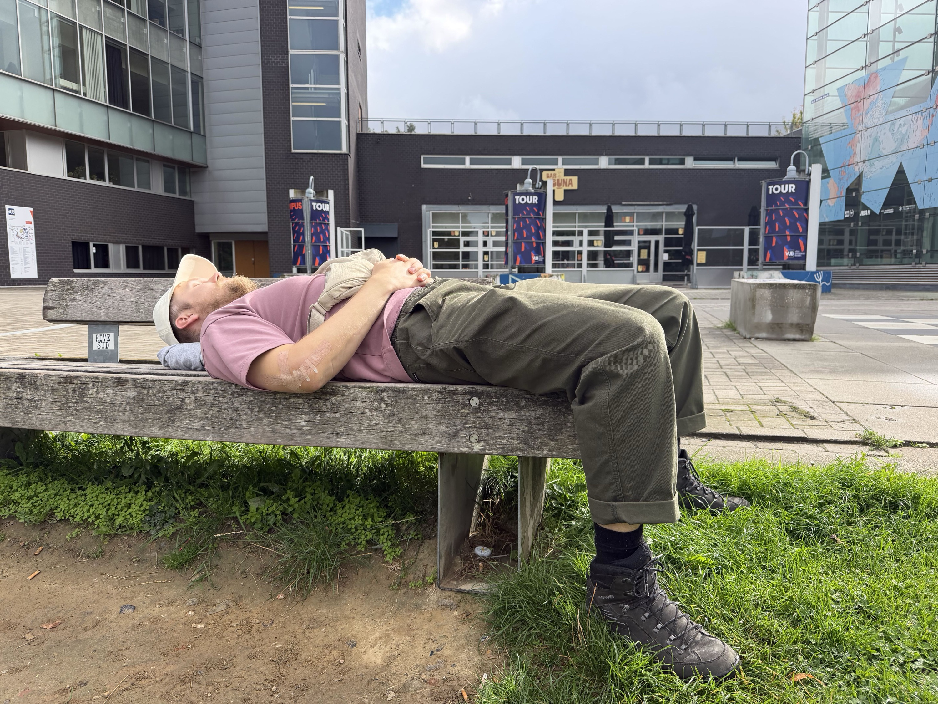 Me recharging outside the venue after a full day of talks. Photo credit: Oks4@Libera.Chat